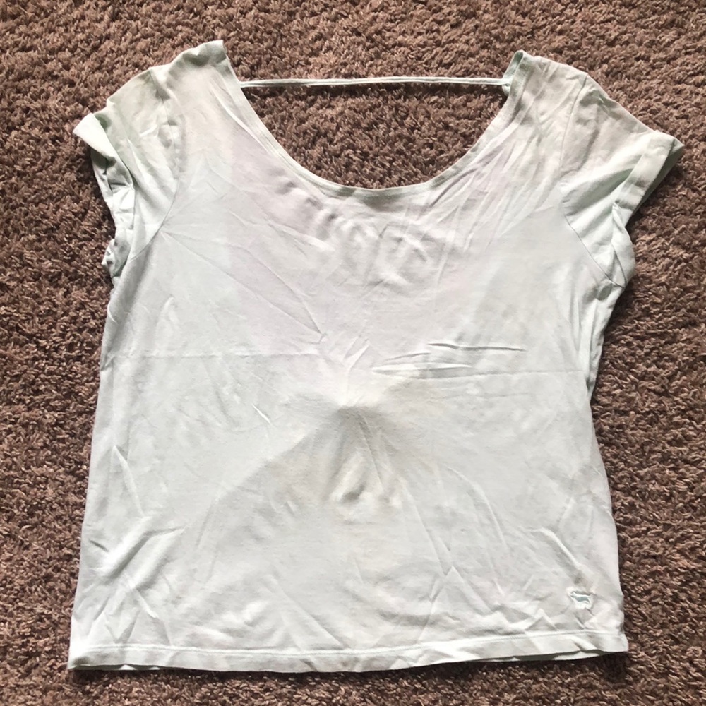 Soft blue, open back tee shirt. PINK